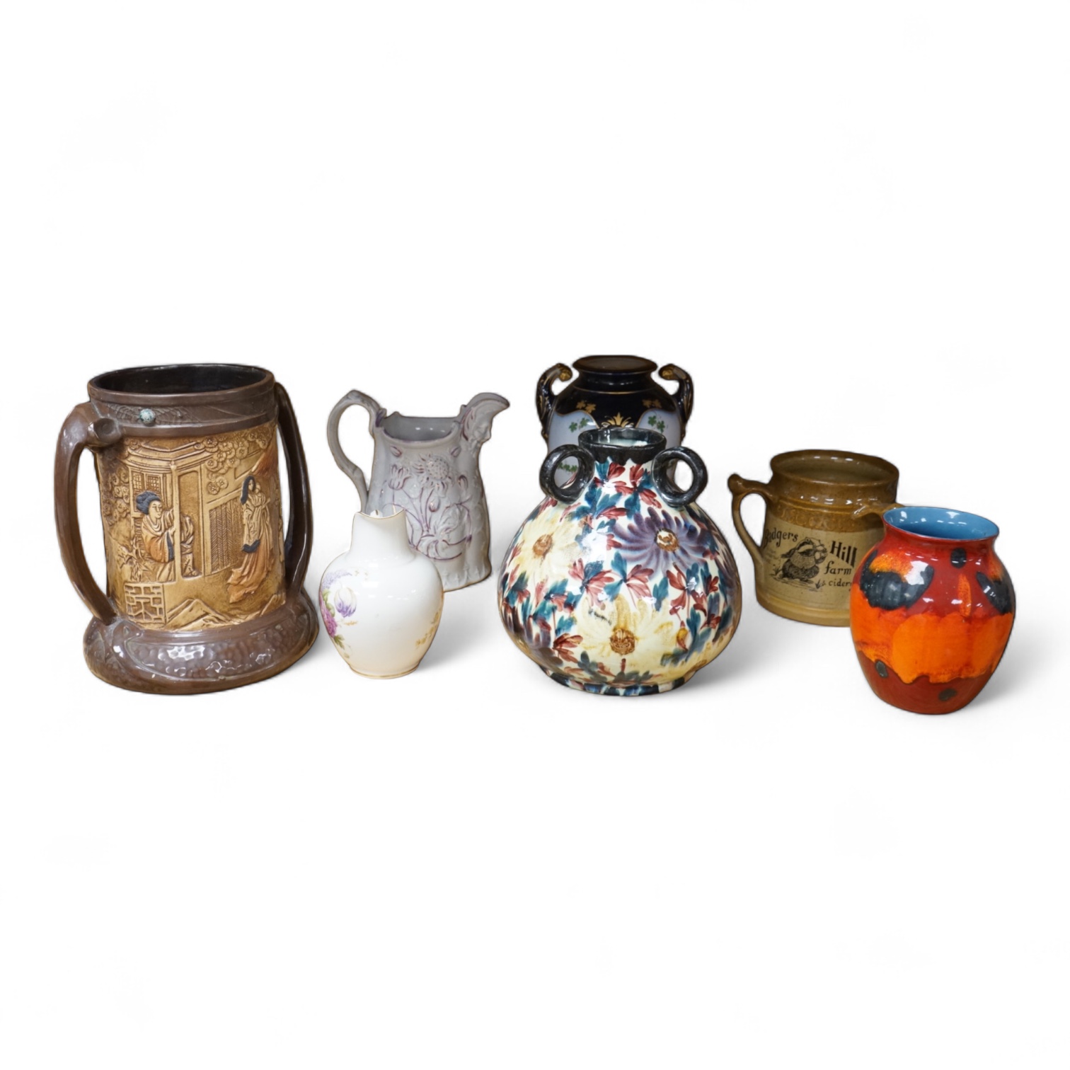 A collection of seven various ceramic vessels including Bretby, Poole, Worcester, continental art pottery etc. 26cm